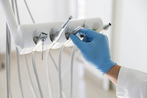 Professional Root Canal Treatment technician working in Newton, KS